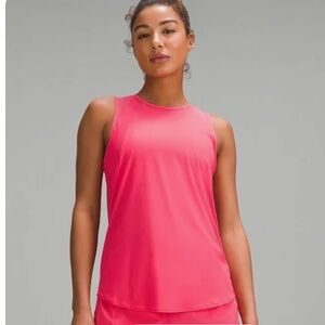 Two new LULULEMON tanks hot/pink & Coral no tags. I’m guessing size small